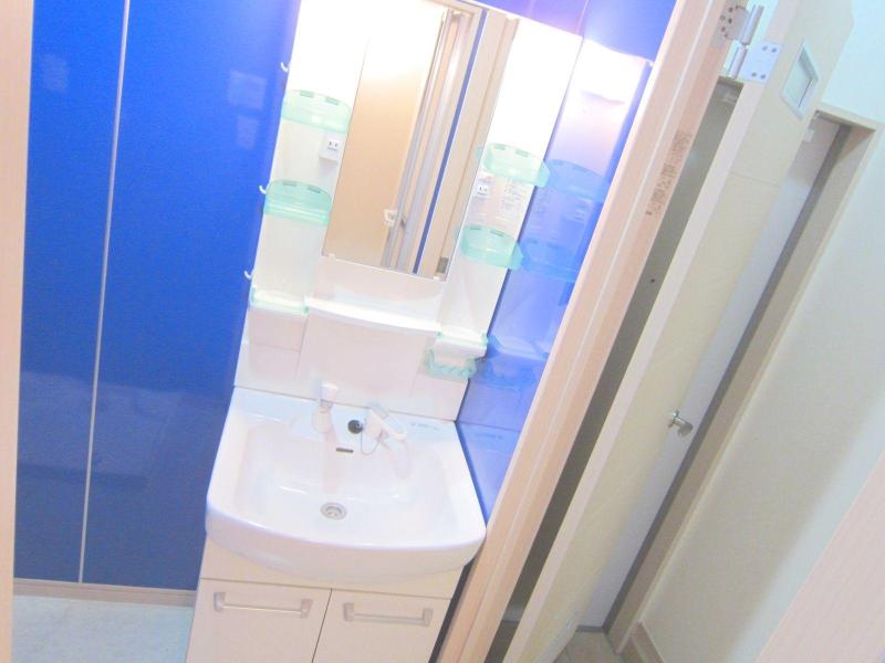 Washroom. Easy preparation with a large lighting with separate wash basin