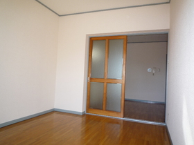 Living and room. Partition by a sliding door. 