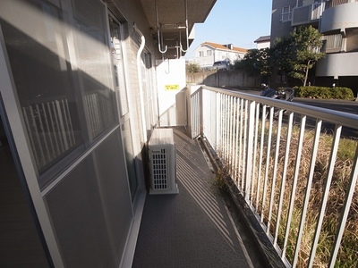 Balcony. There is a sense of relief because there is no building in front.