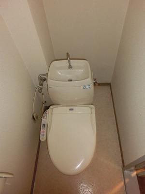 Toilet. Warm water washing toilet seat equipped