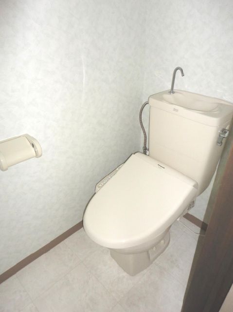 Toilet. Washlet is with