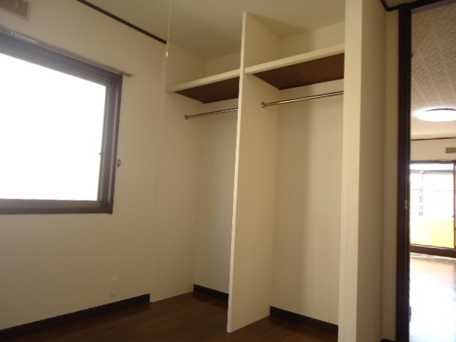 Other room space. Airy walk-in closet has a window