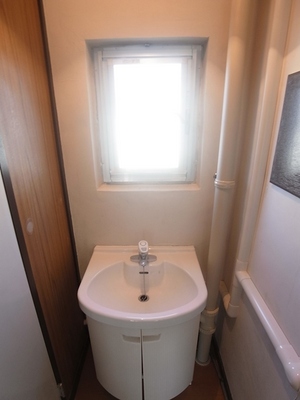 Other Equipment. There is a window even before washstand, It contains the light.