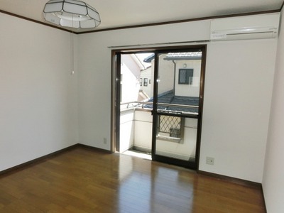 Living and room. It is a bright room.