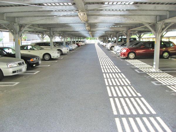 Parking lot. It is self-propelled multi-storey car park. Photo first floor
