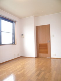 Living and room. There is also a window in the corner room. It is a bright room