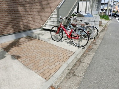 Parking lot. It is a bicycle parking space.