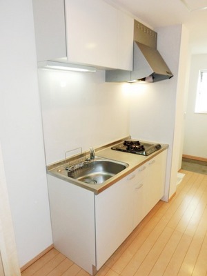 Kitchen. It is a kitchen with a gas stove.