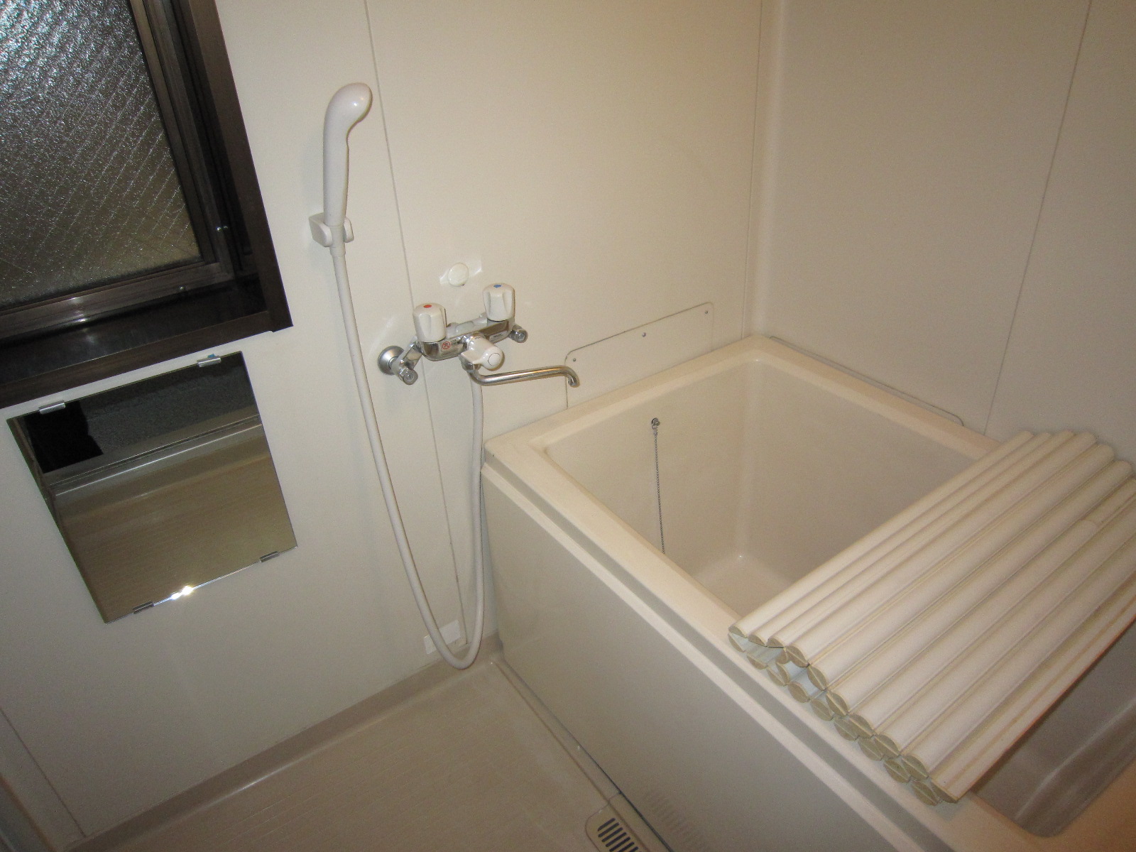 Bath. Wide bathtub, There window in the bathroom