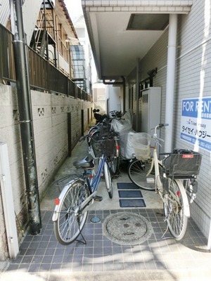 Parking lot. It is a bicycle parking space.