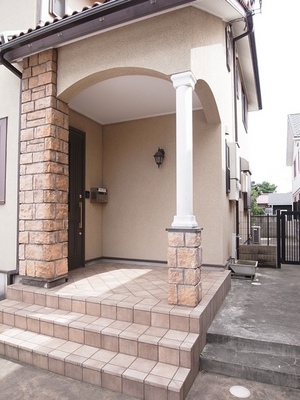 Entrance. It is the front door of the brick tiles.