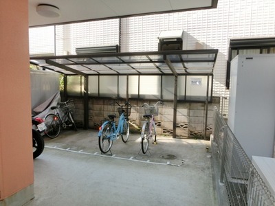 Parking lot. Bicycle parking lot with a roof.