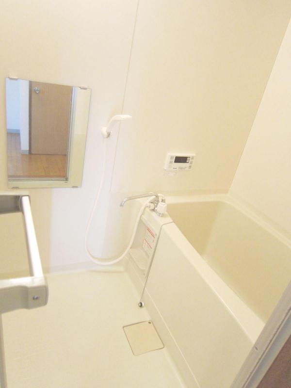 Bath. Tub also comes with also spacious in the mirror