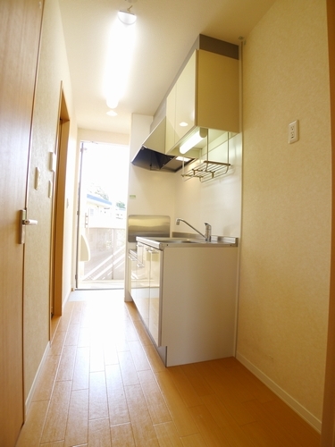 Kitchen. Photos: No. 202 rooms