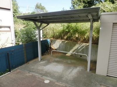 Parking lot. Bicycle parking lot with a roof. 