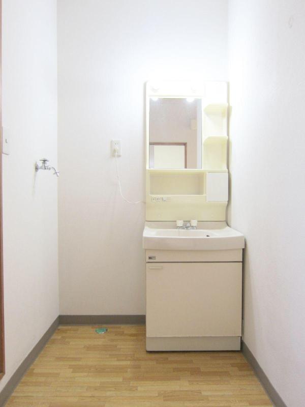 Washroom. It is safe indoor washing machine storage in the rooms also washbasin