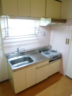 Kitchen. A storage space up and down the kitchen.