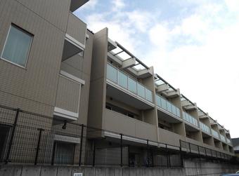 Local appearance photo. Outer wall tiling, RC structure three-story There is a quiet mansion district apart from the front of the station of the hustle and bustle.