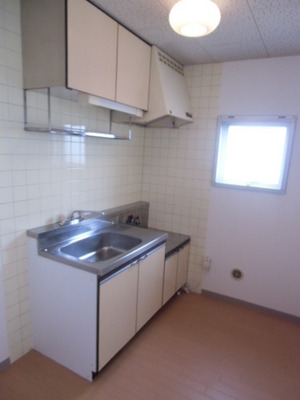 Kitchen. Bright and there is a window in the kitchen next to, You can also ventilation.