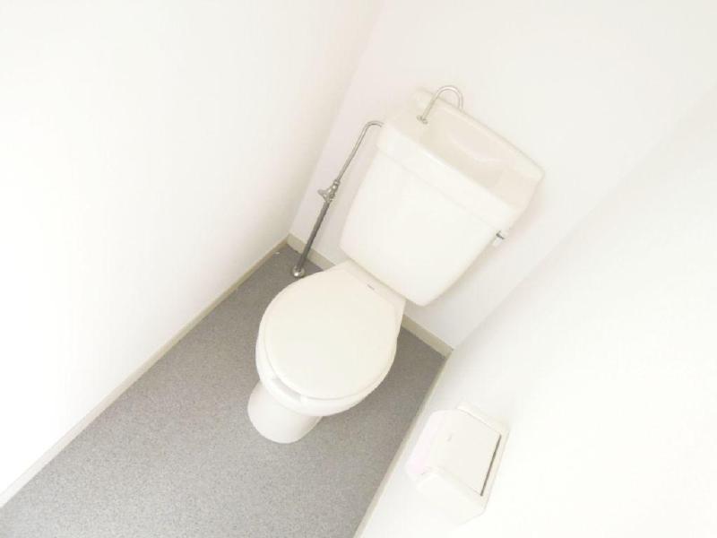 Toilet. It is a space with a cleanliness