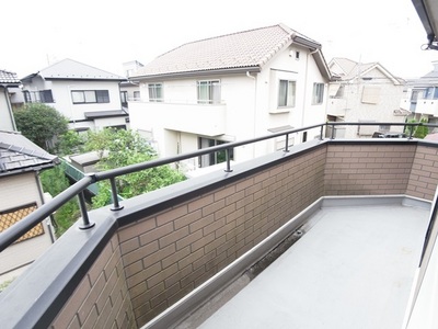 Balcony. Second floor balcony. Sunny, Laundry is dry.