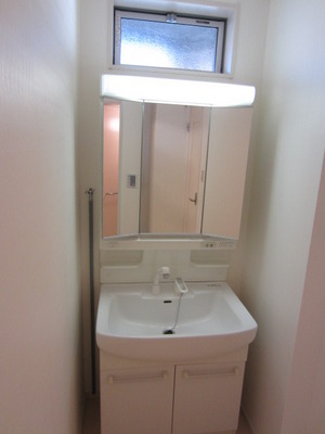 Washroom. There is a window on top of the wash basin, You can ventilation, such as after bathing.