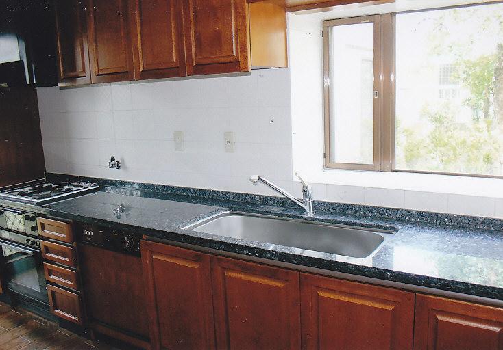 Kitchen. The design of the kitchen had settled woodgrain