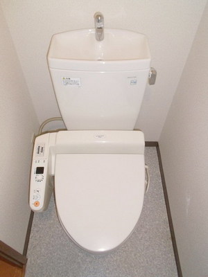 Toilet. It is a toilet seat with a cleaning function