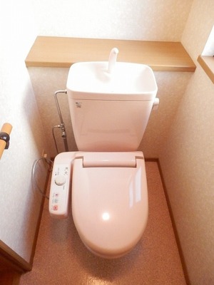 Toilet. 1F is a toilet with a warm water washing toilet seat.