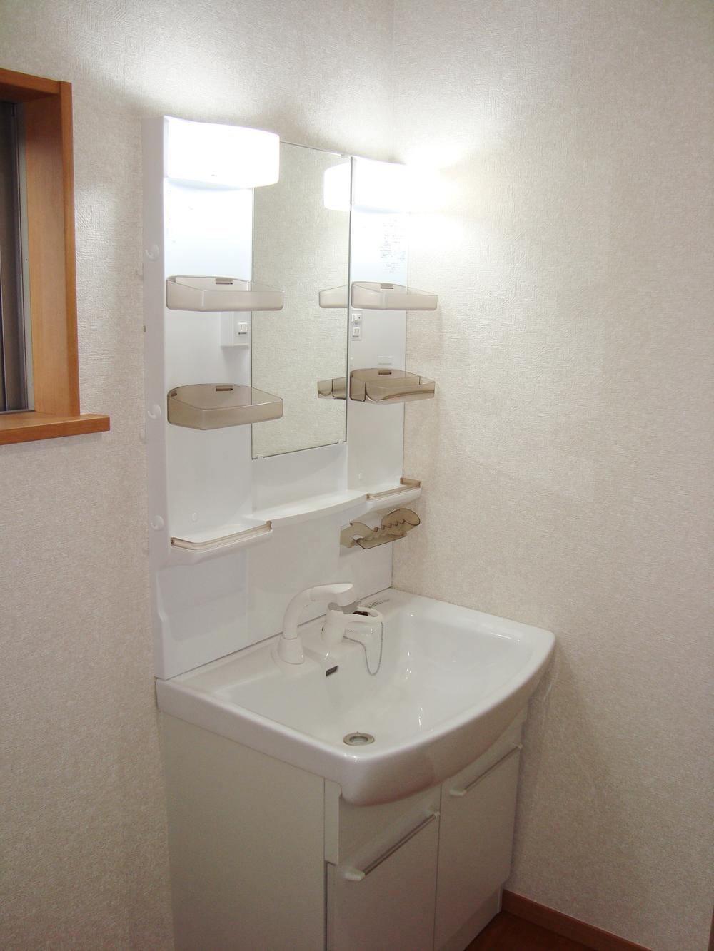 Wash basin, toilet. With hand shower