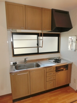 Kitchen. Two-burner gas stove is equipped kitchen. 