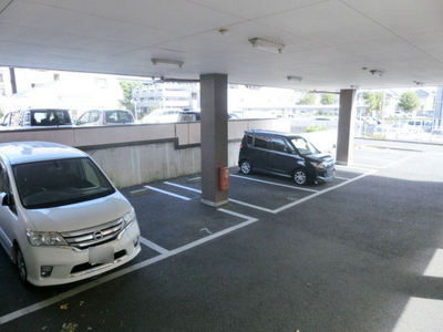 Parking lot. There are bicycle parking on site. 