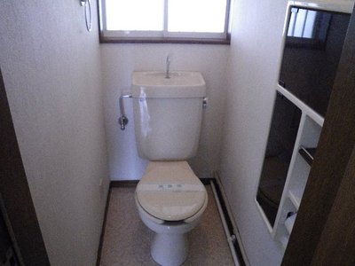 Toilet. It has a window