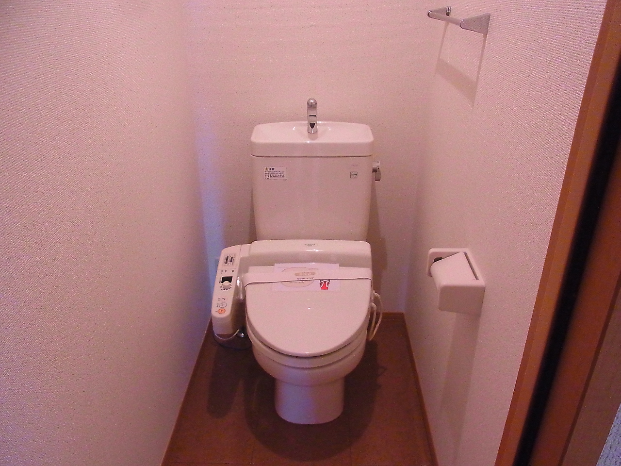 Toilet. It is with warm water washing toilet seat