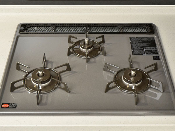 Kitchen.  [3-neck enamel top stove] Care is easy three-necked enamel top stove