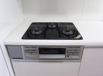 Kitchen. Gas stove is easy to clean with a glass top stove.