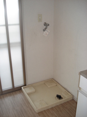 Washroom. There are storage happy indoor washing machine