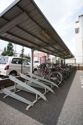 Other common areas. Residents dedicated bicycle parking lot with a roof.