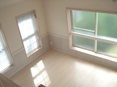 Living and room. Bright Western-style bathed in light from the window