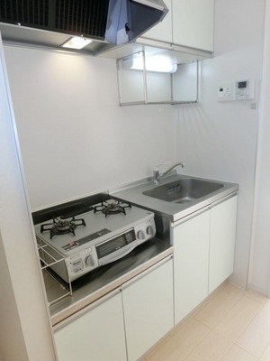 Kitchen. It is with a gas stove.