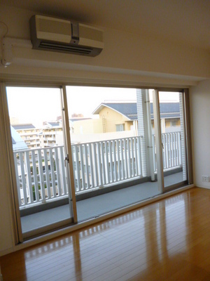 Living and room. Bright and airy because there is a large window with a height width of the window Air conditioning 1