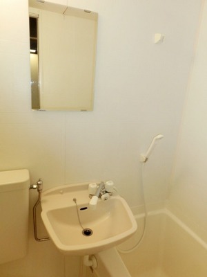 Washroom. There is a wash basin in the bathroom.