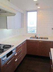 Kitchen. Easy-to-use L-shaped kitchen.  Overlook the green of the park there is a window in front of the sink.