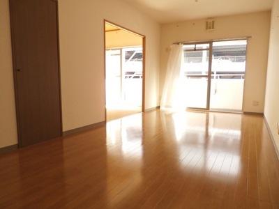 Living and room. Is a bright living room facing south-east-facing balcony.