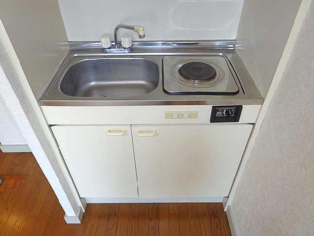 Kitchen. Gas stove has been equipment.