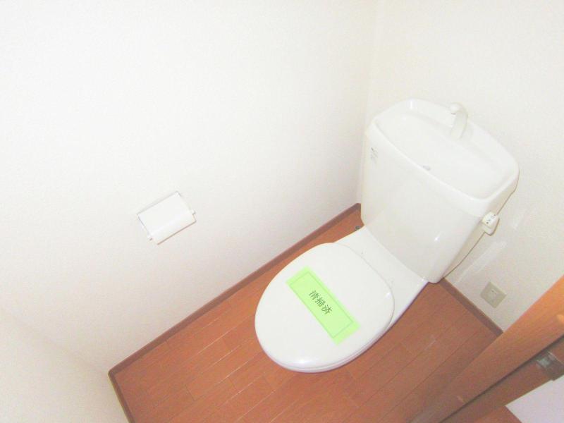 Toilet. It is a space with a cleanliness