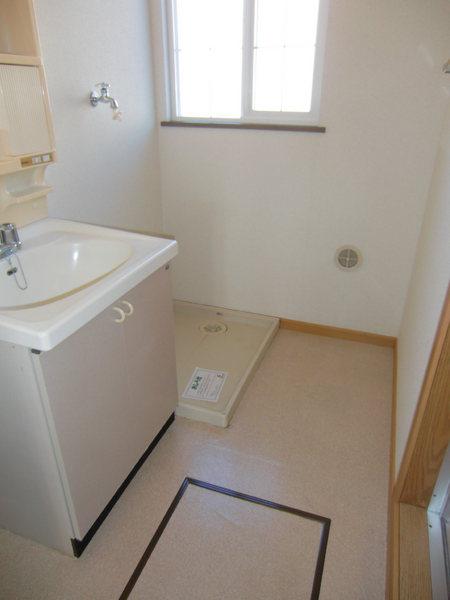 Washroom. With a convenient under-floor storage