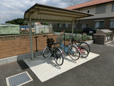 Parking lot. It is a roof with bicycle parking.