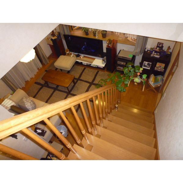 Living. Living room looked down the stairs