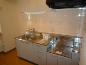 Kitchen. It is a pretty kitchen economic city gas of pink tile! (